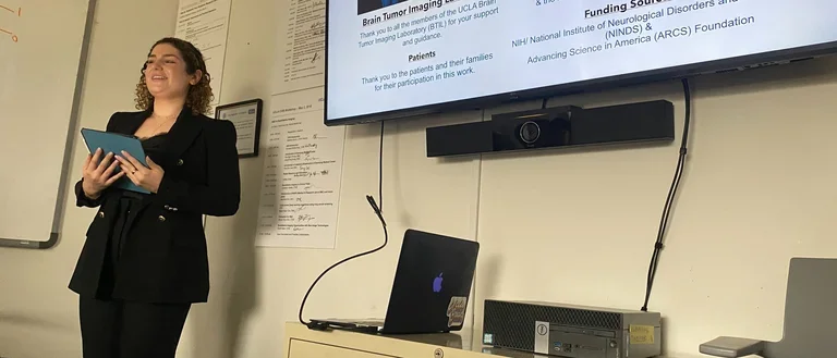 Talia Oughourlian presenting PhD dissertation